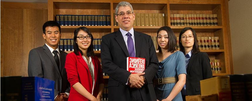 four students pose for a portrait of Hong Yen Chang as part of the Asian Pacific American Law Students Association