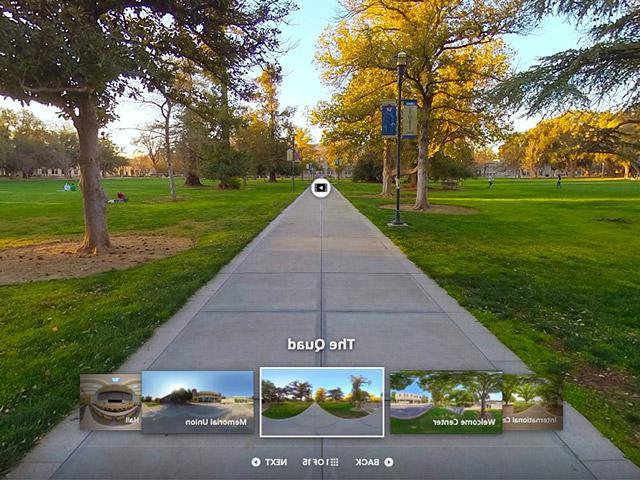An image of campus from the virtual tour showing part of the quad and navigation items for going through the tour.